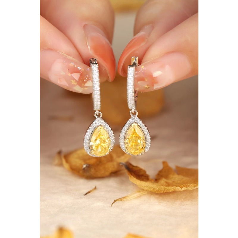 Sd4a2ae72702847afa5832b0a947e70abg Ruihe New Classic Style 18k Gold Gems Simulated Diamond Zirconia Yellow Pear Shape Earrings Women Jewelry Ladies Party Gift