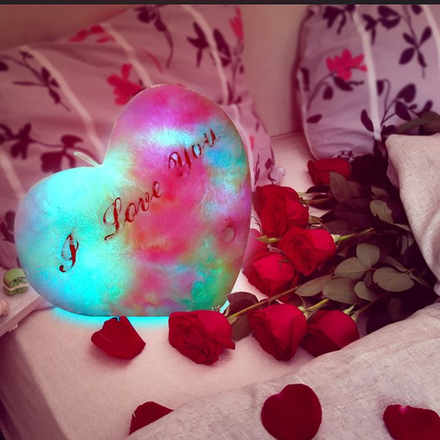 Heart shaped pillow that deals lights up