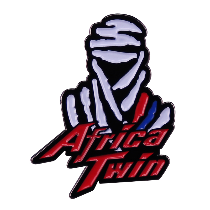 Africa Twin rally enamel pin brooch showing desert adventure rider silhouette in white enamel with red rally script lettering