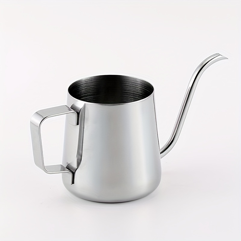 The 304 Stainless Steel Milk Cup Coffee House Essential, part of a high-quality coffee set, is an elegant accessory with a sleek, shiny surface. It features a long curved spout for precise pouring and a robust angular handle that is ideal for frothing milk. The product is photographed against a plain white background.